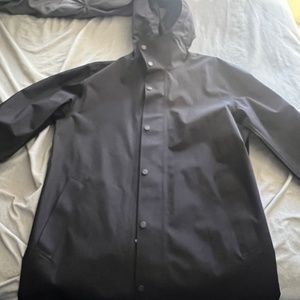 Brand new Uniqlo Rain coat